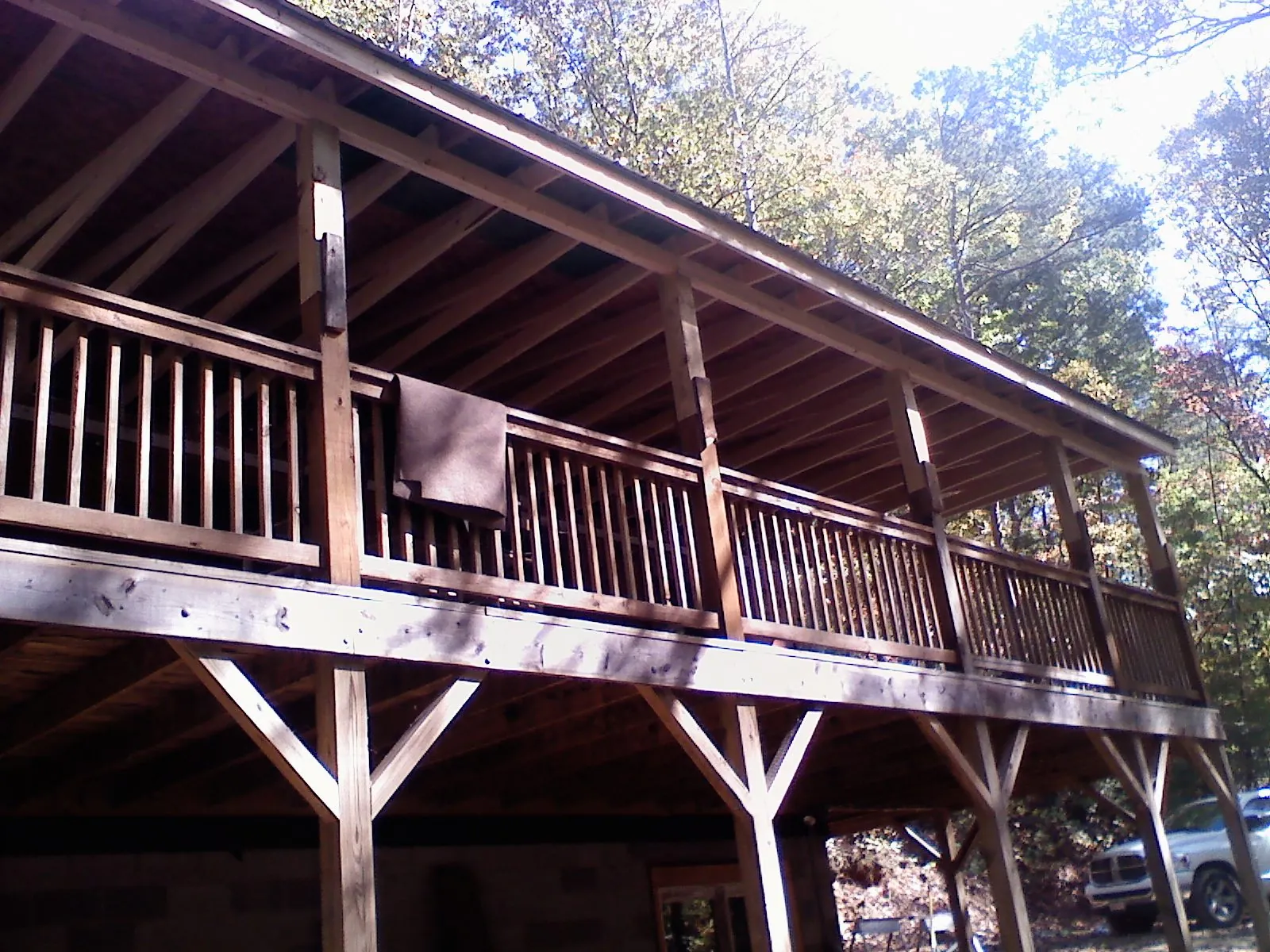 Timber framing under a new elevated porch and deck — Roof Leak Repair in Ball Ground by Roofing Brothers